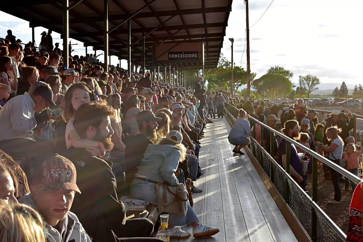 Packed covered grandstands at a Grand View demolition derby.